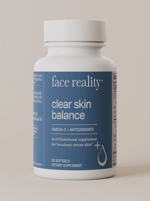 Supplement bottle labeled 'face reality clear skin balance' on a beige background
